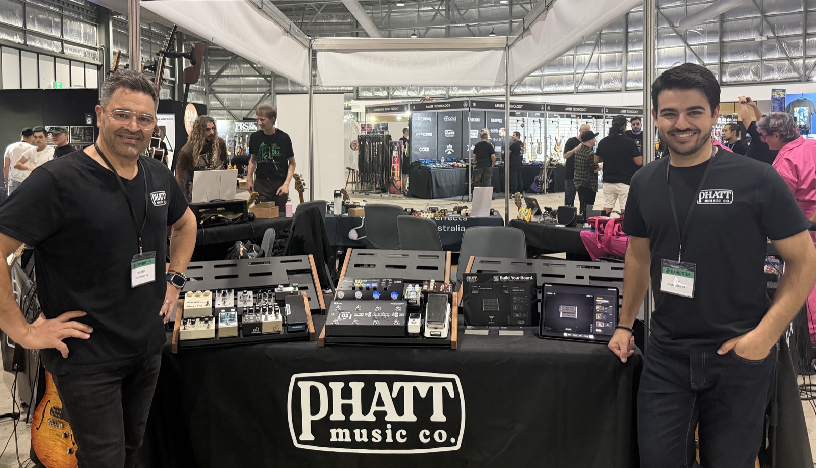 Michael and Kyle Borg at the Phatt Music Co. trade show stand